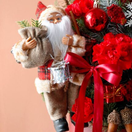 باکس گل کریسمس به همراه عروسک بابانوئل